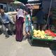 Фото ИА «24.kg» Ошский рынок. Школьник продает дыни 