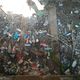 Фото ИА «24.kg». Подвальное помещение за башней в «Манас айылы» превратилось в мусорную свалку 