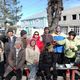 Фото ИА «24.kg». Зухра Мафучин вместе с бездомными и соратниками после обеда. Токмак, 24 февраля 2017 года