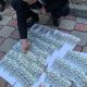 Фото пресс-центра ГКНБ. Замминистра транспорта задержан при даче взятки в размере $10 тысяч