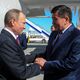 Photo Office of KR Government. . Vladimir Putin at Manas airport, met the Prime Minister of Kyrgyzstan Sooronbay Jeenbekov