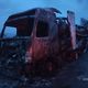 Фото 24.kg. Сгоревший трал, на борту которого, по данным источников, были и машины из Абхазии