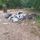 Фото читателя 24.kg. В селе Бостери на территории одного из пансионатов скопились горы мусора