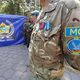 Фото 24.kg. В Бишкеке к Дому правительства на митинг вышли ветераны-миротворцы