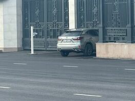 Woman crashes into gates of new "White House" in Bishkek 