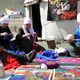 Photo EPA. Women work on tapestries near the shores of the Central Asian country's Lake Issyk-Kul, where the Games are being held