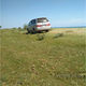 Фото 24.kg. В селе Чырпыкты Иссык-Кульской области машины стали массово заезжать на пляж