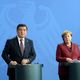 Фото пресс-службы президента КР. Федеральный канцлер Федеративной Республики Германия Ангела Меркель и президент Кыргызстана сделали заявление для прессы
