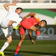 Фото gettyimages.com. Мирлан Мурзаев (слева) в матче с командой Китая на Кубке Азии - 2019