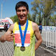 Фото ИА «24.kg». Победитель в забеге на 10 километров — Аман. Бишкек, 2018 год