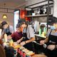 Фото 24.kg. Сотрудники инклюзивного кафе готовят сэндвичи