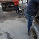 Фото пресс-службы мэрии. Сотрудники Бишкекасфальтсервиса залатали ямы на улице Абдрахманова