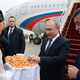 Фото Султана Досалиева. Президента России встречали боорсоками с медом
