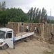 Фото ФМТ. Процесс строительства нового дома для вдовы Бузейнеп