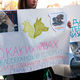 Фото ИА «24.kg». Плакаты горожан с призывами прекратить жестокое обращение с животными