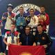Фото Федерации таэквондо ITF КР. Куттубек Мияров (вверху второй справа) и другие кыргызстанцы на чемпионате мира. Германия, 2016 год
